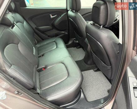 Коричневий Хендай іх35, об'ємом двигуна 2 л та пробігом 230 тис. км за 14300 $, фото 58 на Automoto.ua