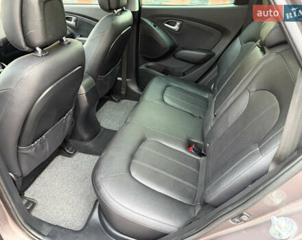 Коричневий Хендай іх35, об'ємом двигуна 2 л та пробігом 230 тис. км за 15300 $, фото 66 на Automoto.ua