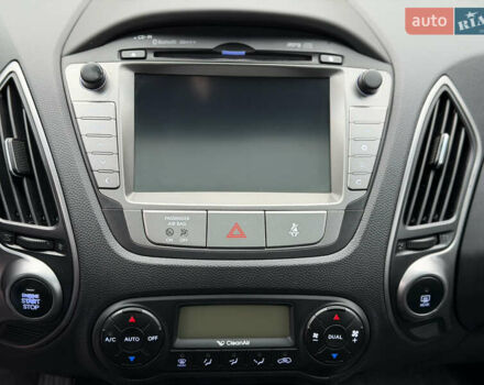 Коричневий Хендай іх35, об'ємом двигуна 2 л та пробігом 230 тис. км за 14300 $, фото 40 на Automoto.ua