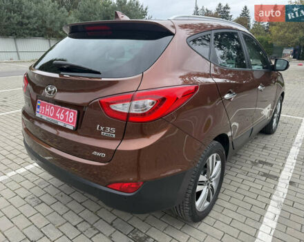 Коричневий Хендай іх35, об'ємом двигуна 2 л та пробігом 211 тис. км за 17400 $, фото 19 на Automoto.ua