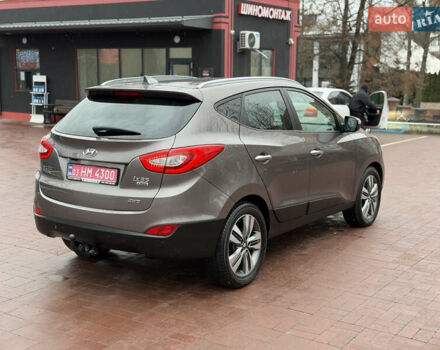 Коричневий Хендай іх35, об'ємом двигуна 2 л та пробігом 230 тис. км за 14300 $, фото 71 на Automoto.ua