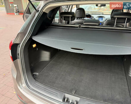 Коричневий Хендай іх35, об'ємом двигуна 2 л та пробігом 230 тис. км за 15300 $, фото 34 на Automoto.ua