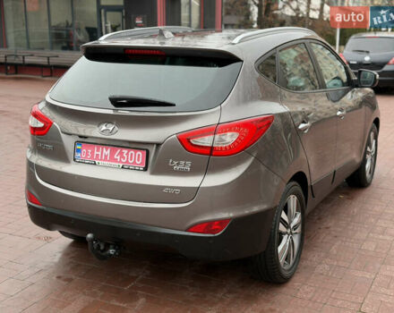 Коричневий Хендай іх35, об'ємом двигуна 2 л та пробігом 230 тис. км за 14300 $, фото 9 на Automoto.ua