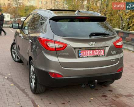 Коричневий Хендай іх35, об'ємом двигуна 2 л та пробігом 230 тис. км за 15300 $, фото 58 на Automoto.ua