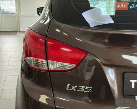 Коричневий Хендай іх35, об'ємом двигуна 2 л та пробігом 155 тис. км за 12990 $, фото 9 на Automoto.ua
