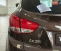 Коричневий Хендай іх35, об'ємом двигуна 2 л та пробігом 155 тис. км за 12990 $, фото 9 на Automoto.ua