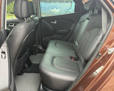 Коричневий Хендай іх35, об'ємом двигуна 2 л та пробігом 211 тис. км за 17400 $, фото 86 на Automoto.ua