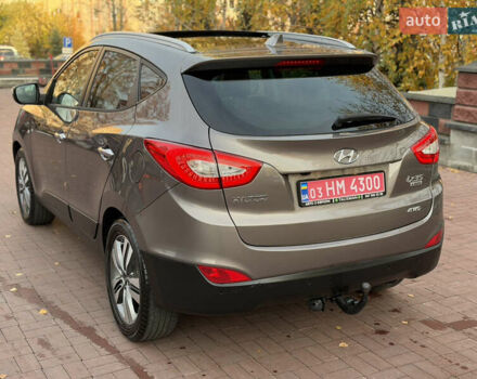 Коричневий Хендай іх35, об'ємом двигуна 2 л та пробігом 230 тис. км за 15300 $, фото 8 на Automoto.ua