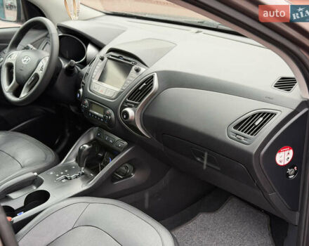 Коричневий Хендай іх35, об'ємом двигуна 2 л та пробігом 230 тис. км за 14300 $, фото 24 на Automoto.ua