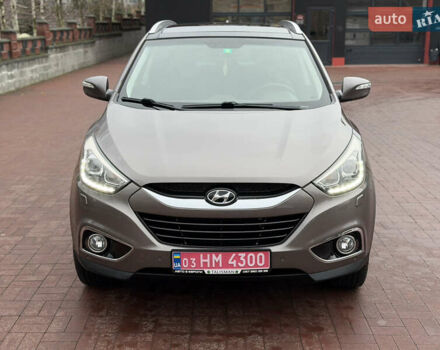 Коричневий Хендай іх35, об'ємом двигуна 2 л та пробігом 230 тис. км за 14300 $, фото 4 на Automoto.ua