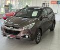 Коричневий Хендай іх35, об'ємом двигуна 2 л та пробігом 155 тис. км за 12990 $, фото 5 на Automoto.ua