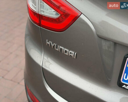 Коричневий Хендай іх35, об'ємом двигуна 2 л та пробігом 230 тис. км за 14300 $, фото 10 на Automoto.ua