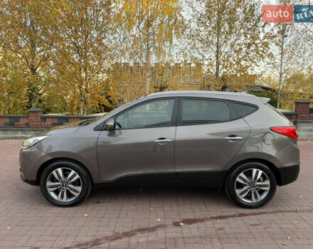 Коричневий Хендай іх35, об'ємом двигуна 2 л та пробігом 230 тис. км за 15300 $, фото 13 на Automoto.ua