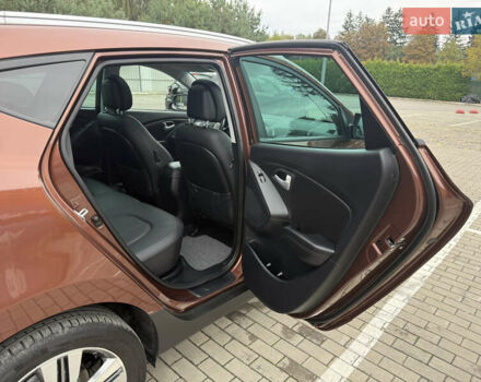 Коричневий Хендай іх35, об'ємом двигуна 2 л та пробігом 211 тис. км за 17400 $, фото 71 на Automoto.ua