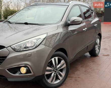 Коричневий Хендай іх35, об'ємом двигуна 2 л та пробігом 230 тис. км за 14300 $, фото 50 на Automoto.ua