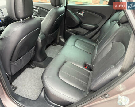 Коричневий Хендай іх35, об'ємом двигуна 2 л та пробігом 230 тис. км за 14300 $, фото 59 на Automoto.ua