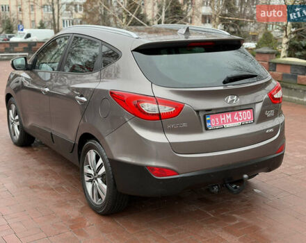 Коричневий Хендай іх35, об'ємом двигуна 2 л та пробігом 230 тис. км за 14300 $, фото 8 на Automoto.ua