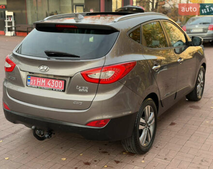 Коричневий Хендай іх35, об'ємом двигуна 2 л та пробігом 230 тис. км за 15300 $, фото 9 на Automoto.ua