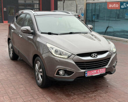 Коричневий Хендай іх35, об'ємом двигуна 2 л та пробігом 230 тис. км за 14300 $, фото 7 на Automoto.ua