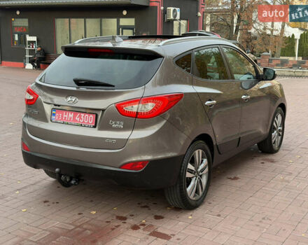 Коричневий Хендай іх35, об'ємом двигуна 2 л та пробігом 230 тис. км за 15300 $, фото 76 на Automoto.ua