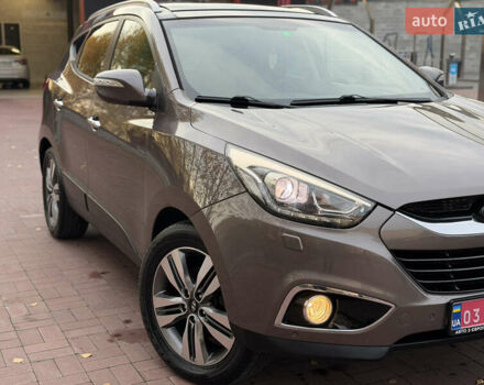 Коричневий Хендай іх35, об'ємом двигуна 2 л та пробігом 230 тис. км за 15300 $, фото 60 на Automoto.ua