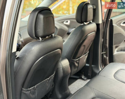 Коричневий Хендай іх35, об'ємом двигуна 2 л та пробігом 230 тис. км за 15300 $, фото 28 на Automoto.ua