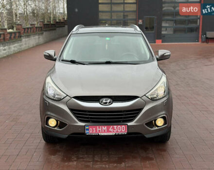 Коричневий Хендай іх35, об'ємом двигуна 2 л та пробігом 230 тис. км за 14300 $, фото 74 на Automoto.ua