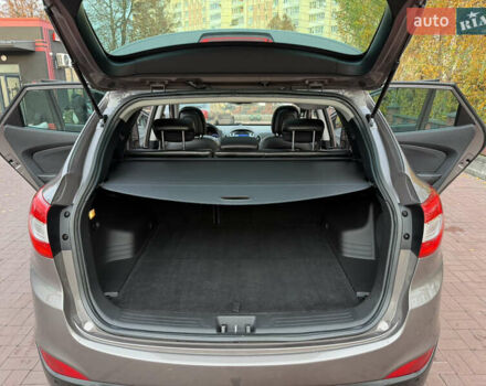 Коричневий Хендай іх35, об'ємом двигуна 2 л та пробігом 230 тис. км за 15300 $, фото 33 на Automoto.ua