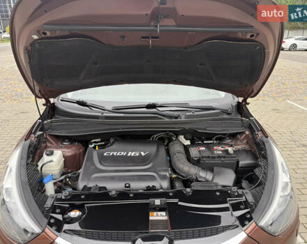 Коричневий Хендай іх35, об'ємом двигуна 2 л та пробігом 211 тис. км за 17400 $, фото 29 на Automoto.ua