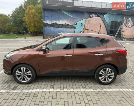 Коричневий Хендай іх35, об'ємом двигуна 2 л та пробігом 211 тис. км за 17400 $, фото 13 на Automoto.ua
