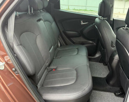 Коричневий Хендай іх35, об'ємом двигуна 2 л та пробігом 211 тис. км за 17400 $, фото 77 на Automoto.ua