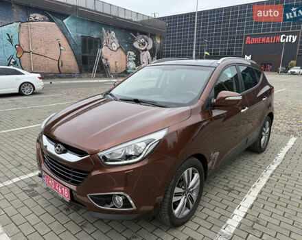 Коричневий Хендай іх35, об'ємом двигуна 2 л та пробігом 211 тис. км за 17400 $, фото 8 на Automoto.ua