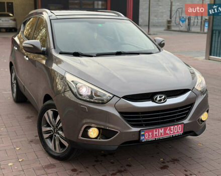 Коричневий Хендай іх35, об'ємом двигуна 2 л та пробігом 230 тис. км за 15300 $, фото 56 на Automoto.ua