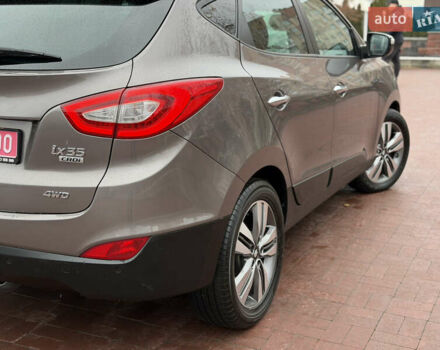 Коричневий Хендай іх35, об'ємом двигуна 2 л та пробігом 230 тис. км за 14300 $, фото 52 на Automoto.ua