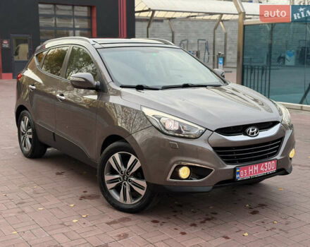 Коричневий Хендай іх35, об'ємом двигуна 2 л та пробігом 230 тис. км за 15300 $, фото 52 на Automoto.ua