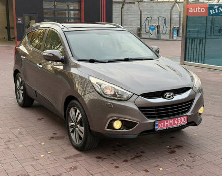 Коричневий Хендай іх35, об'ємом двигуна 2 л та пробігом 230 тис. км за 15300 $, фото 74 на Automoto.ua