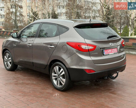 Коричневий Хендай іх35, об'ємом двигуна 2 л та пробігом 230 тис. км за 14300 $, фото 2 на Automoto.ua