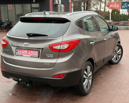 Коричневий Хендай іх35, об'ємом двигуна 2 л та пробігом 230 тис. км за 14300 $, фото 54 на Automoto.ua