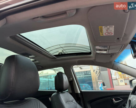 Коричневий Хендай іх35, об'ємом двигуна 2 л та пробігом 230 тис. км за 15300 $, фото 48 на Automoto.ua