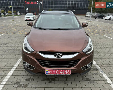 Коричневий Хендай іх35, об'ємом двигуна 2 л та пробігом 211 тис. км за 17400 $, фото 7 на Automoto.ua