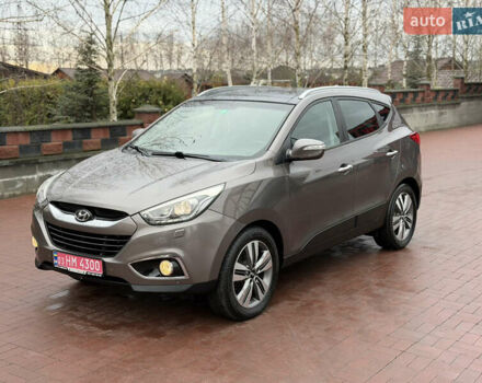 Коричневий Хендай іх35, об'ємом двигуна 2 л та пробігом 230 тис. км за 14300 $, фото 70 на Automoto.ua