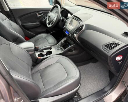 Коричневий Хендай іх35, об'ємом двигуна 2 л та пробігом 230 тис. км за 14300 $, фото 57 на Automoto.ua