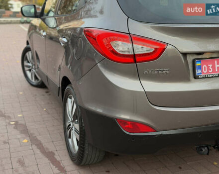 Коричневий Хендай іх35, об'ємом двигуна 2 л та пробігом 230 тис. км за 15300 $, фото 61 на Automoto.ua