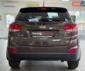 Коричневий Хендай іх35, об'ємом двигуна 2 л та пробігом 155 тис. км за 12990 $, фото 10 на Automoto.ua