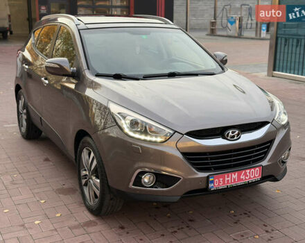 Коричневий Хендай іх35, об'ємом двигуна 2 л та пробігом 230 тис. км за 15300 $, фото 7 на Automoto.ua