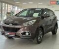 Коричневий Хендай іх35, об'ємом двигуна 2 л та пробігом 155 тис. км за 12990 $, фото 6 на Automoto.ua