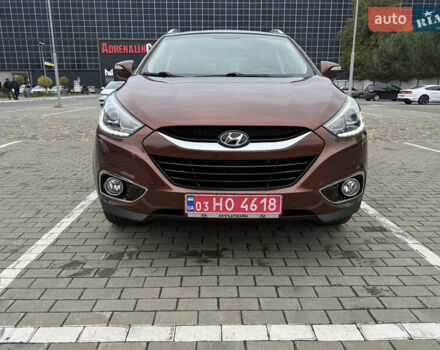 Коричневий Хендай іх35, об'ємом двигуна 2 л та пробігом 211 тис. км за 17400 $, фото 5 на Automoto.ua