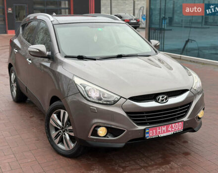 Коричневий Хендай іх35, об'ємом двигуна 2 л та пробігом 230 тис. км за 14300 $, фото 47 на Automoto.ua