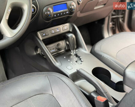 Коричневий Хендай іх35, об'ємом двигуна 2 л та пробігом 230 тис. км за 15300 $, фото 32 на Automoto.ua