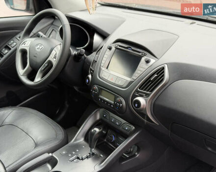 Коричневий Хендай іх35, об'ємом двигуна 2 л та пробігом 230 тис. км за 14300 $, фото 26 на Automoto.ua